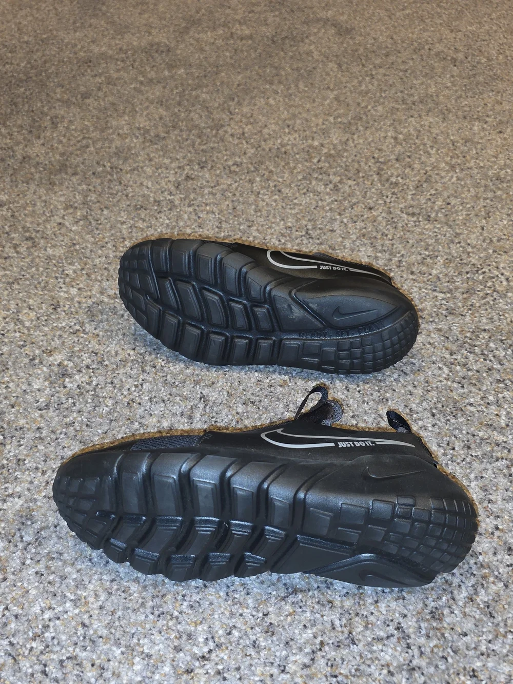 Nike Kids Black Slip-On Sneakers with Gray Swoosh